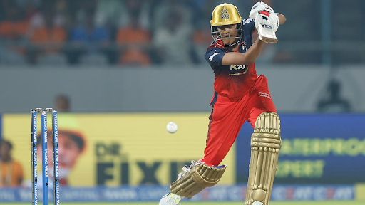 Gujarat Giants captain at the toss during WPL 2026 match against RCB, choosing to field first.