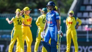 Australia Women celebrating after defeating India Women by 185 runs in an international cricket match.